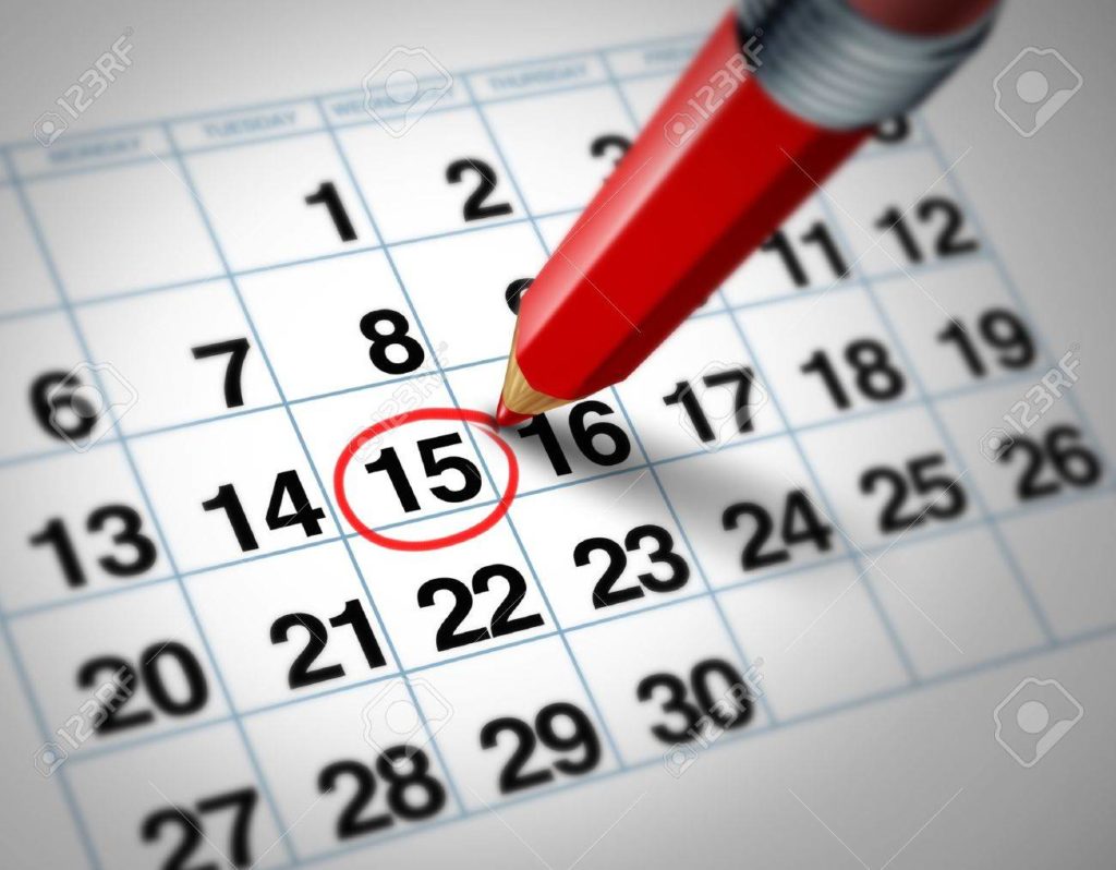 10542720 establecer una fecha importante en un calendario con un lapiz rojo marcado un dia del mes que